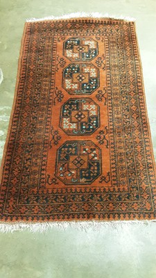 Lot 1207 - Afghan Nahzat rug with four central medallions on red and blue ground, 167cm x 94cm