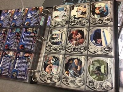 Lot 325 - Collection of James Bond 007 trading cards, within two folders, plus some loose and two Bond cars books