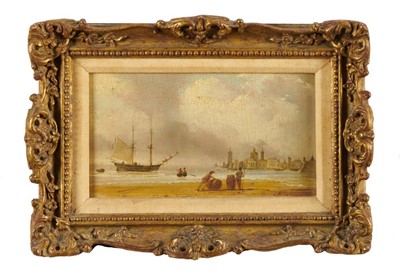 Lot 1118 - 19th century Continental School oil on panel - View of a coastal city with sailors unloading barrels on a beach, with a merchantman just offshore