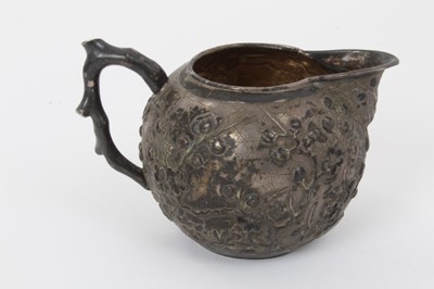 Lot 206 - Late 19th/early 20th century Chinese silver cream  jug with floral decoration