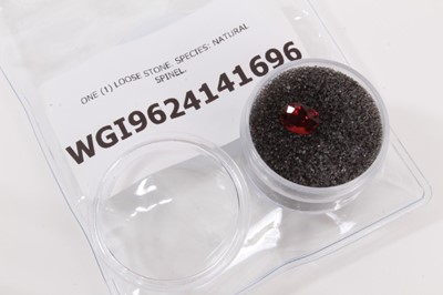 Lot 544 - Unmounted oval mixed cut natural red spinel weighing approximately 1.42cts, with World Gemmological Institute Report