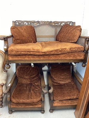 Lot 1218 - Early 20th century bergere three piece suite with loose cushions