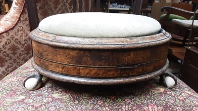 Lot 1221 - Victorian circular footstool on brass claw and ceramic ball feet, together with a mahogany wine table with circular top (2)