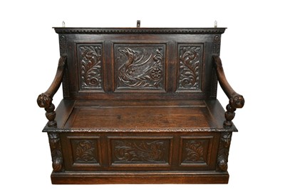 Lot 1339 - Victorian carved oak box settle