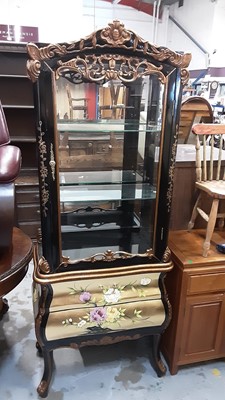 Lot 1033 - Black lacquered and floral painted two height standing display cabinet