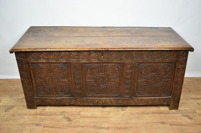 Lot 1348 - 18th century carved oak coffer