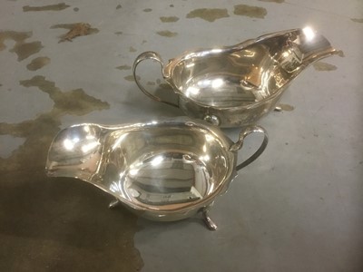 Lot 891 - Two silver sauceboats.