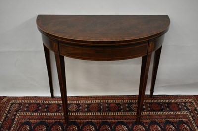 Lot 1423 - George III mahogany crossbanded and patera inlaid demi-lune card table