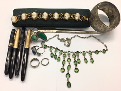 Lot 800 - Silver gilt cameo bracelet, various silver and white metal dress rings, paste necklace, plated bangle, silver plated letter opener and four fountain pens