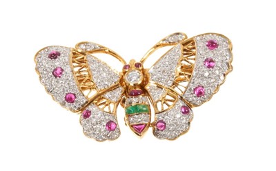 Lot 424 - Diamond, ruby and emerald butterfly brooch with articulated wings