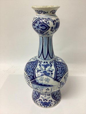 Lot 20 - 18th / 19th century Dutch Delft vase, together with a large Dutch Delft tulip form vase. (2)