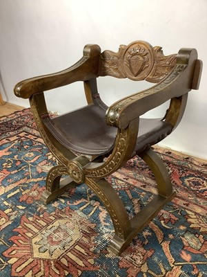 Lot 1163 - Italian carved walnut chair with leather seat