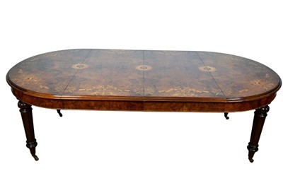 Lot 1368 - Victorian style figured walnut and inlaid dining table with two additional leaves