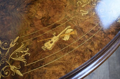 Lot 1368 - Victorian style figured walnut and inlaid dining table with two additional leaves