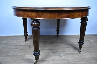 Lot 1368 - Victorian style figured walnut and inlaid dining table with two additional leaves