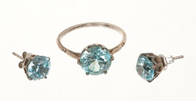 Lot 458 - Blue zircon single stone ring and a pair of blue zircon single stone stud earrings.