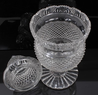Lot 67 - A large 19th century cut glass covered vase/bonbonniere, diamond and facet cut, the rim with fan-shaped pattern, on knopped stem and circular base, 32cm high