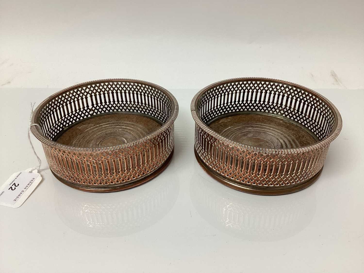 Lot 22 - Pair of Victorian silver plated and turned wood bottle coasters