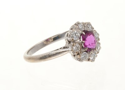 Lot 431 - Ruby and diamond cluster ring