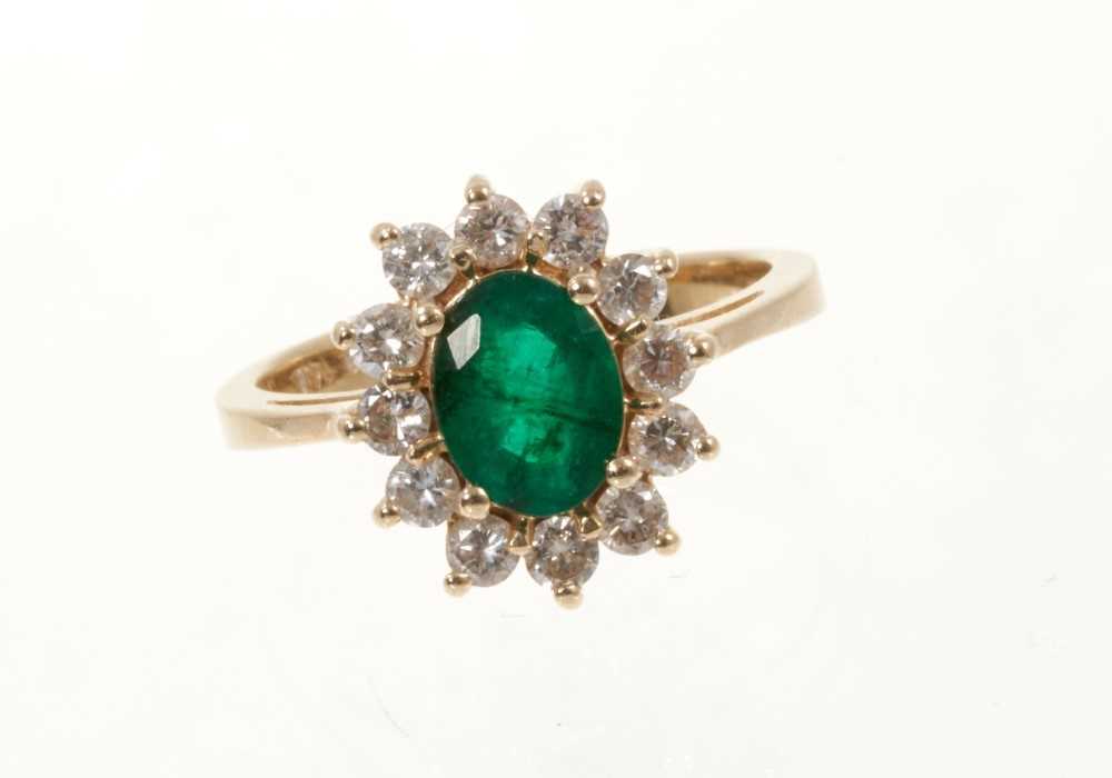 Lot 432 - Emerald and diamond cluster ring