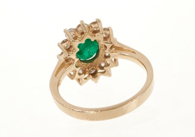 Lot 432 - Emerald and diamond cluster ring