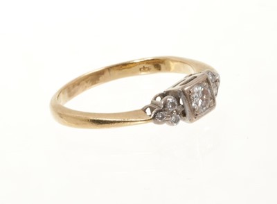 Lot 435 - Diamond ring with a central brilliant cut diamond flanked by diamond shoulders
