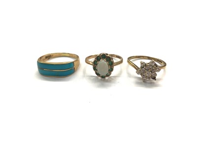 Lot 801 - Egyptian gold turquoise panel ring and two 9ct gold gem set cluter rings (3)