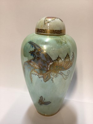 Lot 1103 - Wedgwood butterfly lustre vase and cover