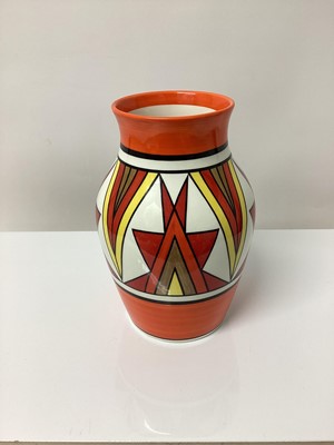 Lot 11 - Wedgwood Clarice Cliff Centenary Collection vase with geometric decoration on orange, yellow, brown and white ground, 20cm high, boxed