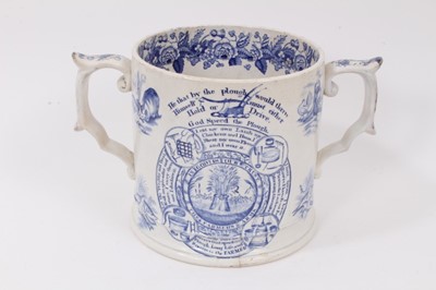 Lot 106 - A large Victorian transfer printed 'God Speed the Plough' loving cup, with vignettes of animals and floral border, 16cm high