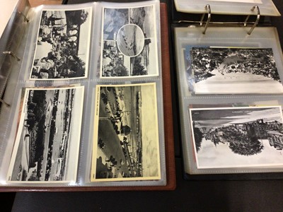 Lot 89 - Two albums of postcards, all GB topographical and comic, approximately 110