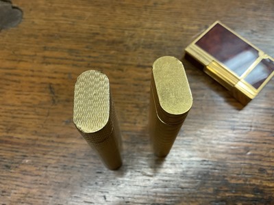 Lot 535 - Two vintage Cartier lighters and a Dupont lighter