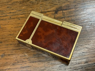 Lot 535 - Two vintage Cartier lighters and a Dupont lighter