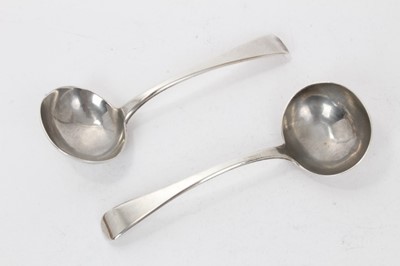 Lot 289 - Pair of George III silver Old English pattern sauce ladles