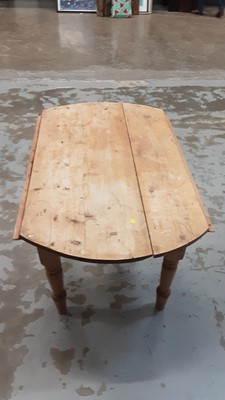 Lot 1005 - Old pine drop leaf table on turned legs, opening to 128cm x 115cm