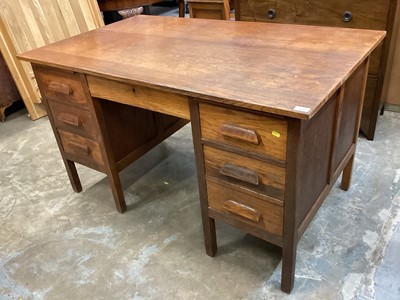 Lot 1021 - Mid 20th century oak twin pedestal desk with five drawers, 137cm wide, 81.5cm deep