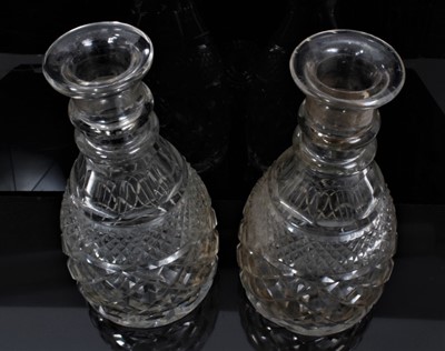Lot 89 - A pair of 19th century two-ring cut glass decanters with mushroom stoppers, 28cm high