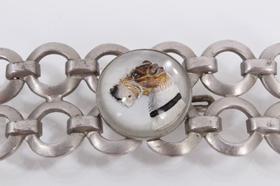 Lot 926 - Essex crystal type belt buckle decorated with a dogs head