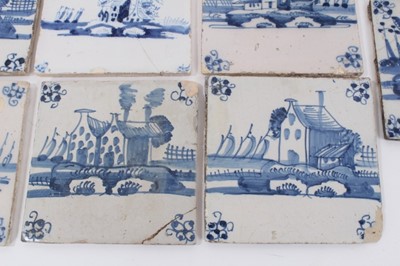 Lot 149 - Collection of fourteen 18th century Delft blue and white tiles, decorated with buildings and Dutch scenes (14)