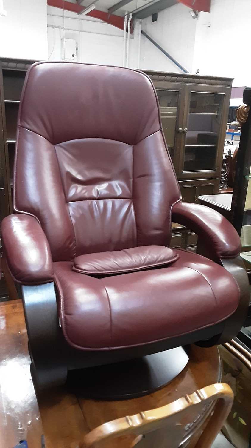Lot 1032 Contemporary leather reclining armchair