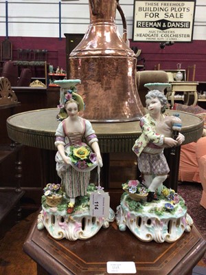 Lot 114 - Pair of Meissen style candlesticks