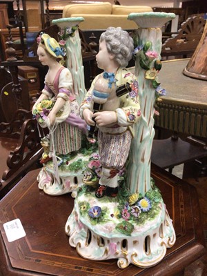 Lot 114 - Pair of Meissen style candlesticks
