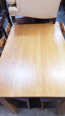 Lot 1036 - Contemporary light oak dining table on square legs, 150cm x 91cm