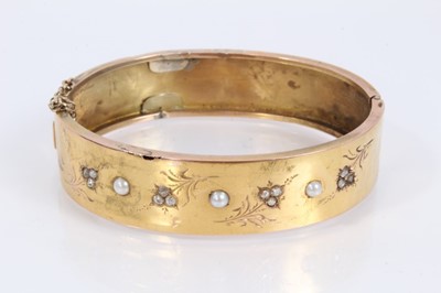 Lot 853 - Victorian yellow metal hinged bangle set with rose cut diamonds and seed pearls, yellow metal mourning ring, 9ct gold dress ring and an 18ct gold filled card case