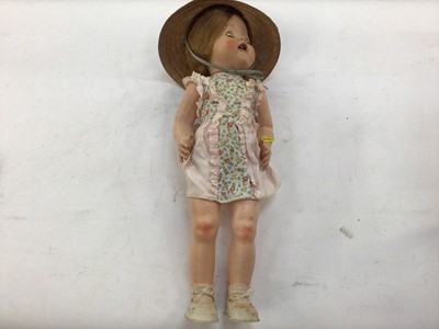 Lot 1930 - Doll hard plastic head and body with hat and original clothes and shoes