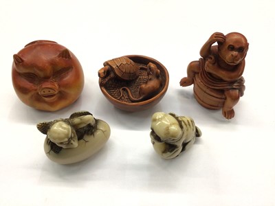 Lot 507 - Five Japanese carved box wood and resin netsukes