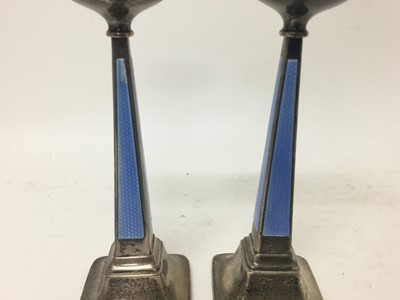 Lot 283 - Pair of Art Deco silver and blue enamel candlesticks