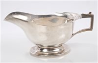 Lot 310 - 1930s Silverer-footed sauce boat with a wavy...