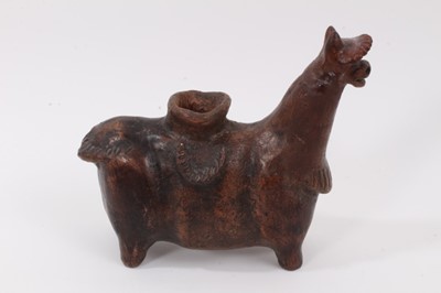 Lot 58 - Pre-Columbian pottery figure of a llama, with damage and repair