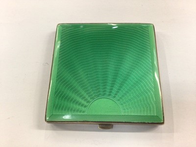 Lot 823 - 1950s silver and green enamel powder compact